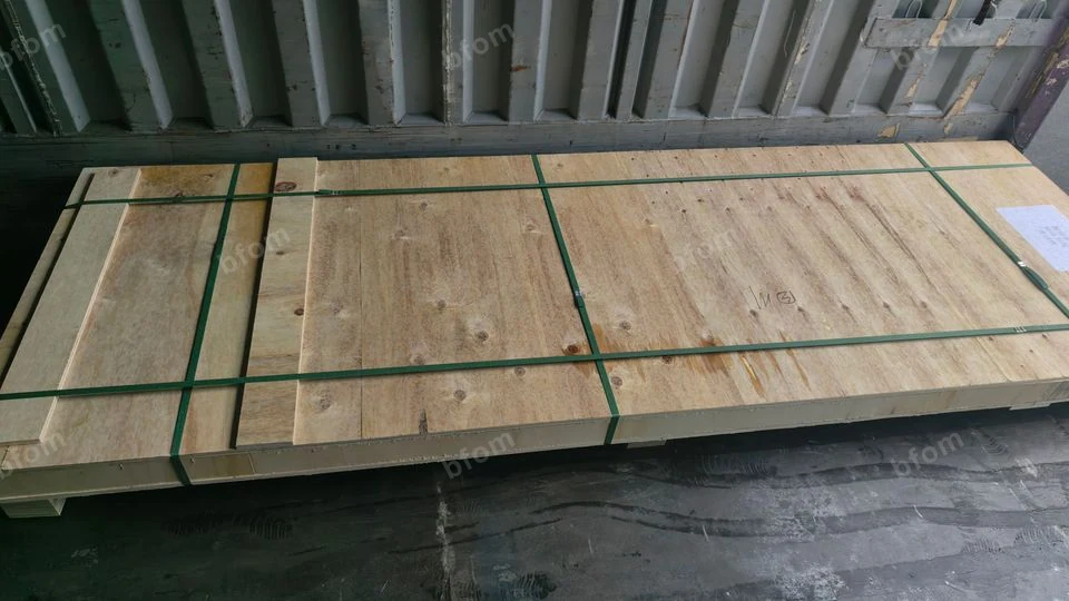 Protected resin panels secured in an export plywood crate