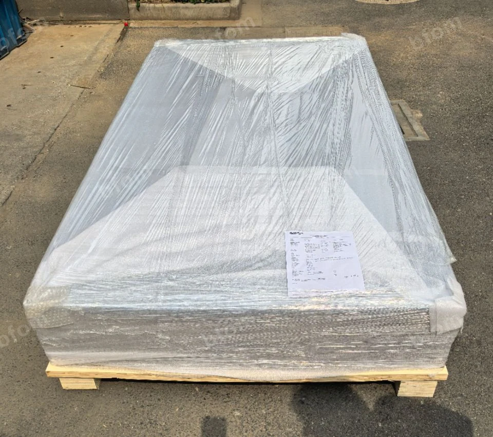 Wrapped resin panel package on a timber pallet before dispatch