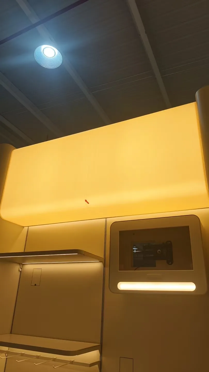 Illuminated overhead retail module