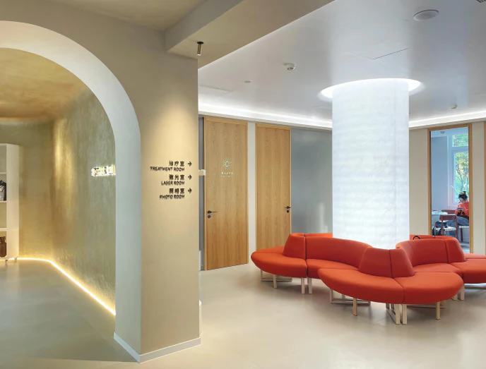 Reception with crystal rose seating and luminous column